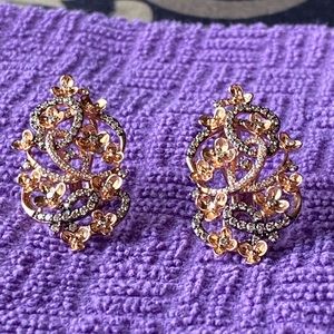 Levian 14K rose gold earrings with diamonds.